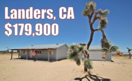 Fenced/gated home in Landers, off paved road.